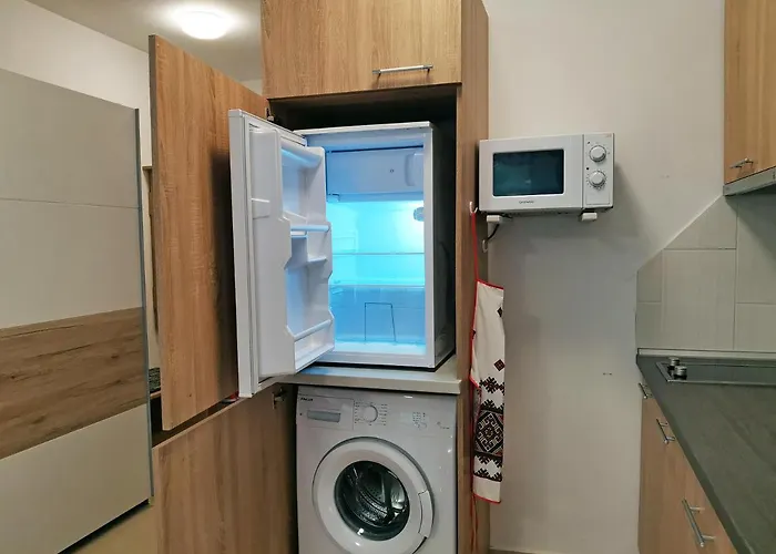 светлая новая студия в Апартамент *